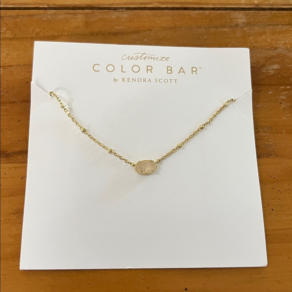 Kendra Scott Eliza (?)  gold tone necklace, new on card